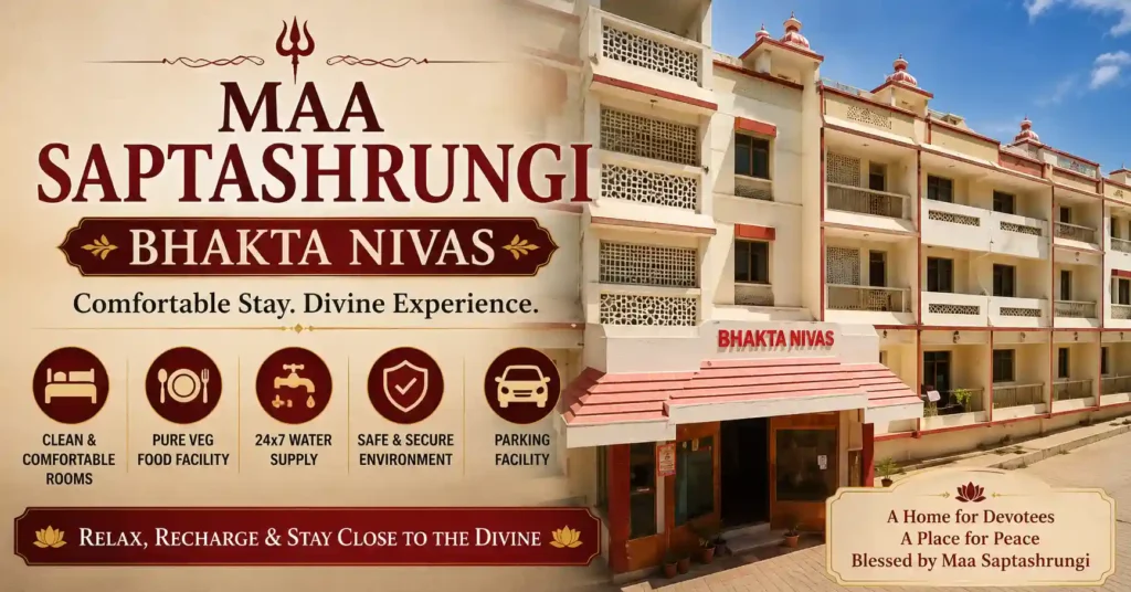 Maa Saptashrungi Bhakta Niwas providing comfortable accommodation and facilities for pilgrims visiting the temple.